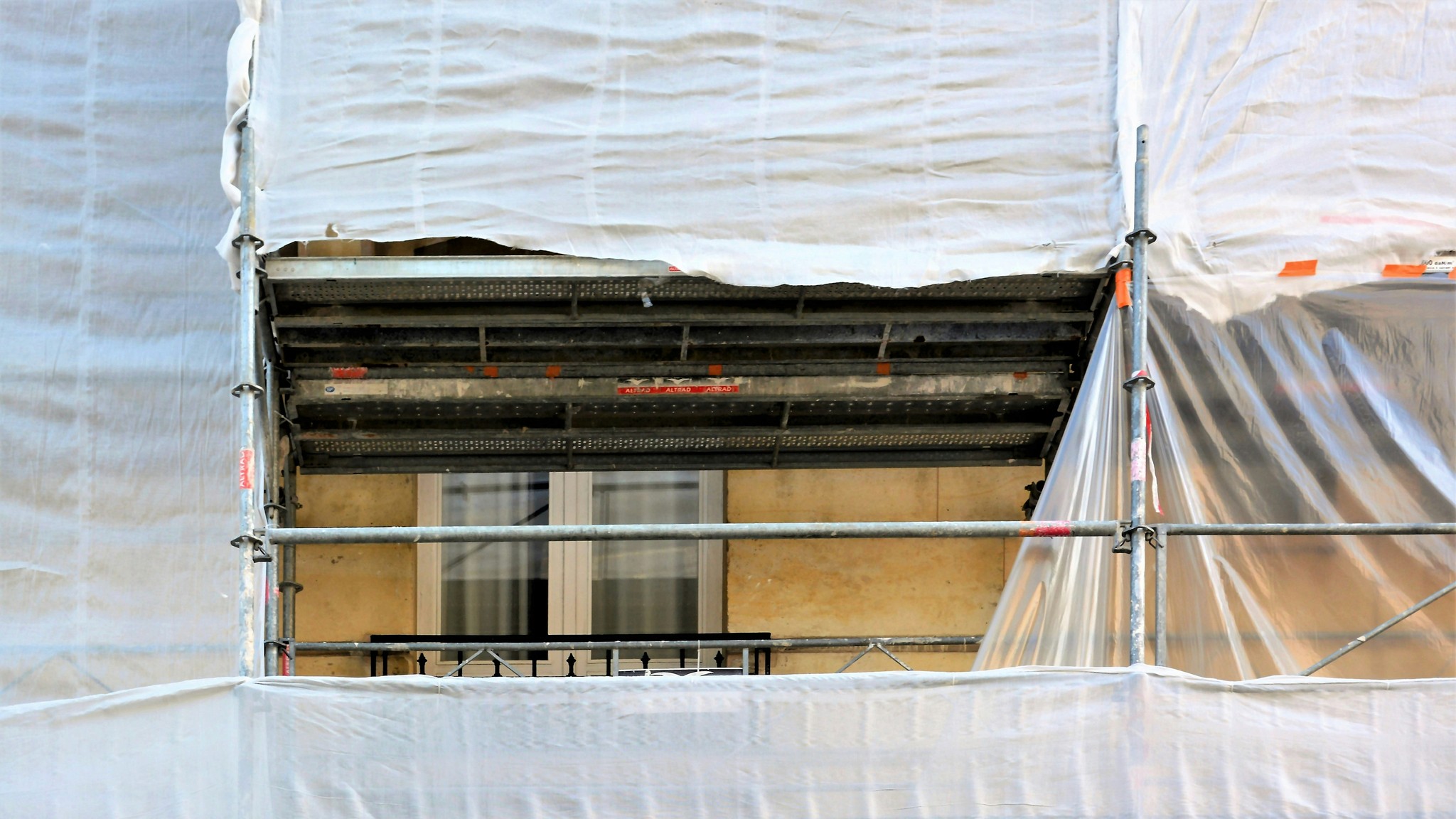 white curtain on window during daytime